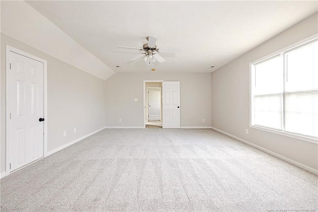 1414 Seabiscuit Dr, Parkton, NC 28371 - unfurnished room with a ceiling fan, light carpet, baseboards, and vaulted ceiling