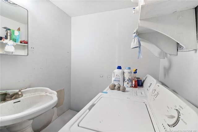 830 Edenwood Dr, Fayetteville, NC 28303 - bathroom featuring independent washer and dryer and a sink