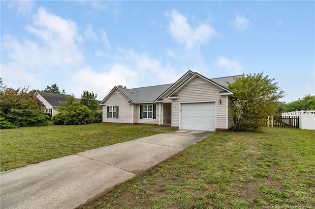 225 Northwoods Dr, Raeford, NC 28376 - single story home with driveway and an attached garage