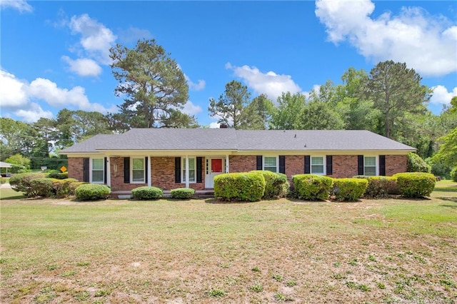 500 Cecil St, Fayetteville, NC 28312 - single story home with a front yard, covered porch, and brick siding