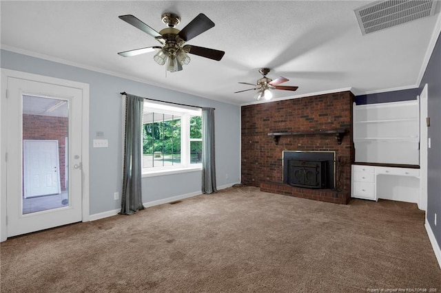 500 Cecil St, Fayetteville, NC 28312 - unfurnished living room featuring carpet flooring, ceiling fan, a wood stove, baseboards, and crown molding