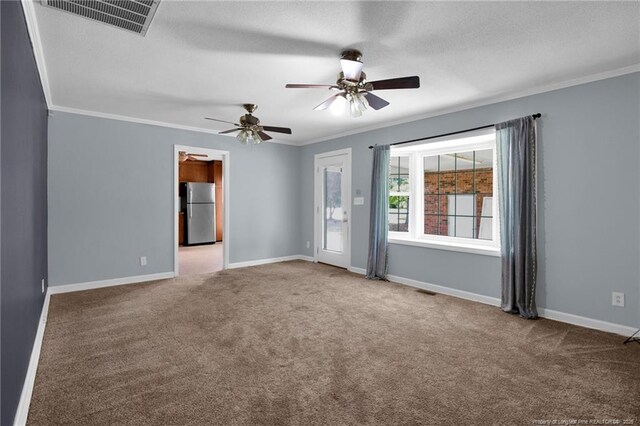 500 Cecil St, Fayetteville, NC 28312 - carpeted empty room with ornamental molding, baseboards, and ceiling fan