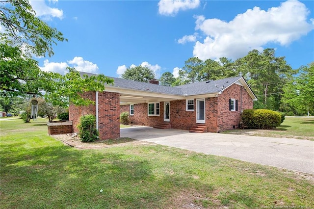 500 Cecil St, Fayetteville, NC 28312 - view of front of home featuring entry steps, brick siding, concrete driveway, and a front lawn