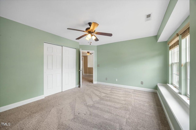132 Ryder Cup Cir, Raleigh, NC 27603 - unfurnished bedroom with carpet, a closet, and ceiling fan