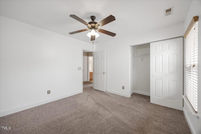 132 Ryder Cup Cir, Raleigh, NC 27603 - unfurnished bedroom featuring carpet, a closet, and a ceiling fan