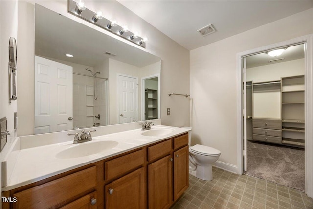 132 Ryder Cup Cir, Raleigh, NC 27603 - full bathroom with double vanity, a shower, and a walk in closet