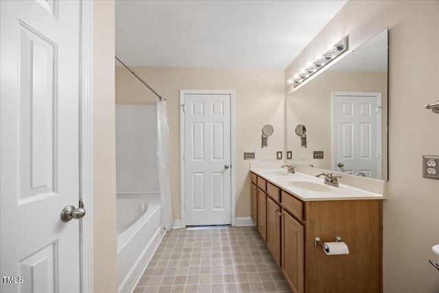 132 Ryder Cup Cir, Raleigh, NC 27603 - full bathroom featuring double vanity, shower / tub combo with curtain, and tile patterned floors