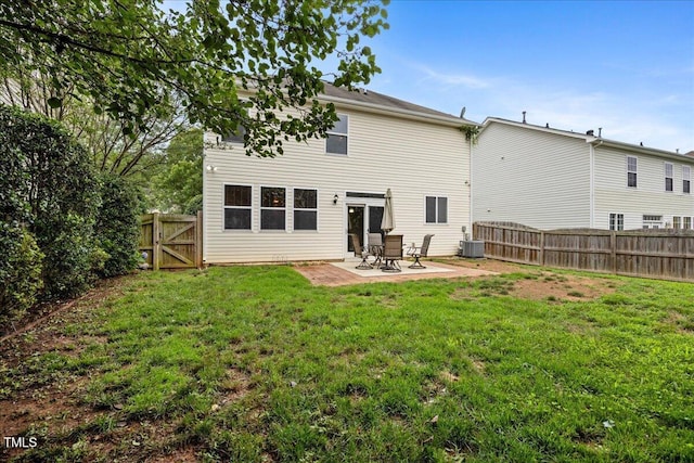 132 Ryder Cup Cir, Raleigh, NC 27603 - back of property featuring a fenced backyard, a patio, and a gate