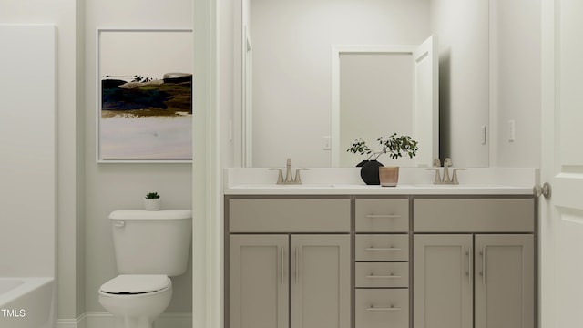945 Cassa Clubhouse Way, Knightdale, NC 27545 - full bathroom with double vanity, toilet, a tub, and baseboards