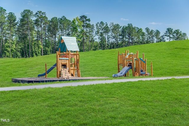 945 Cassa Clubhouse Way, Knightdale, NC 27545 - view of play area with a lawn