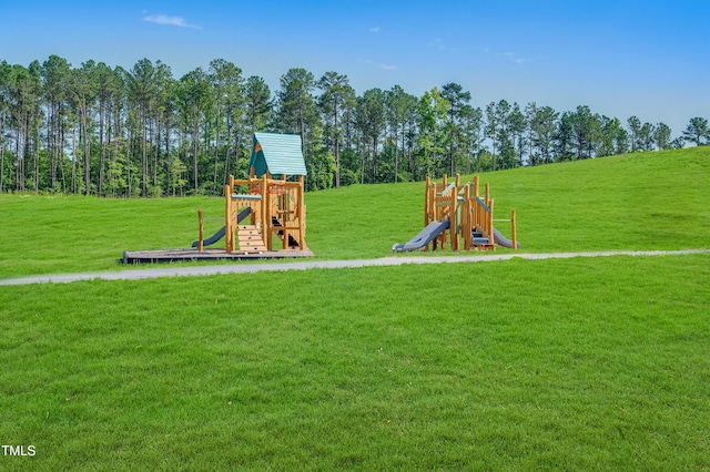 945 Cassa Clubhouse Way, Knightdale, NC 27545 - communal playground with a lawn