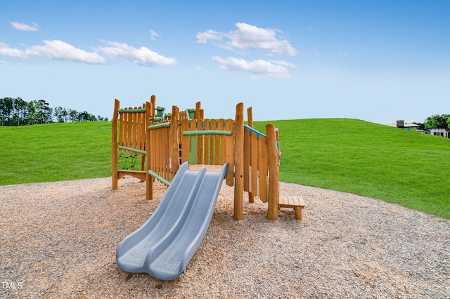 945 Cassa Clubhouse Way, Knightdale, NC 27545 - community jungle gym featuring a lawn