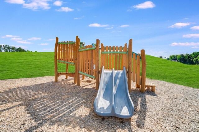 945 Cassa Clubhouse Way, Knightdale, NC 27545 - community play area featuring a yard