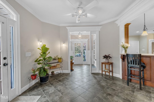 4620 Gomar Ln, Fuquay Varina, NC 27526 - entryway with baseboards, ceiling fan, ornamental molding, and ornate columns
