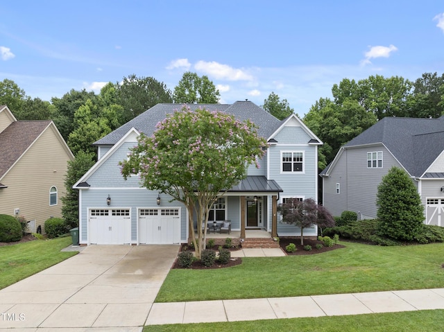 106 Painted Turtle Ln, Cary, NC 27519 - craftsman-style home with covered porch, concrete driveway, a front lawn, and an attached garage