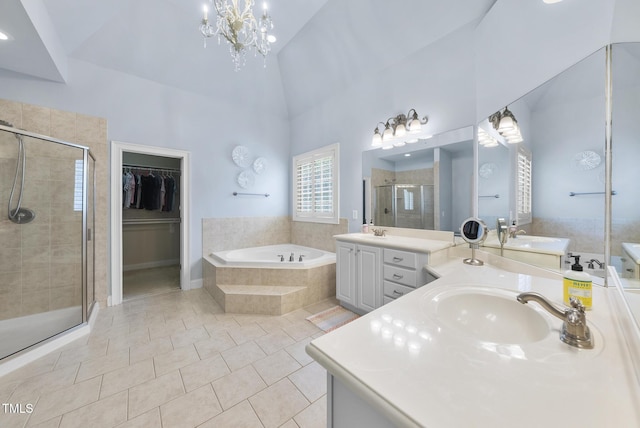 106 Painted Turtle Ln, Cary, NC 27519 - bathroom with a stall shower, vanity, a garden tub, tile patterned flooring, and a chandelier