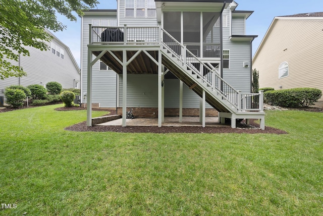 106 Painted Turtle Ln, Cary, NC 27519 - back of house with a lawn, a sunroom, a patio, stairs, and central AC