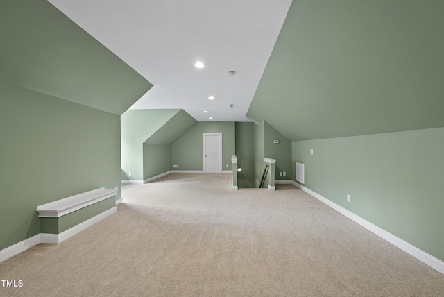 106 Painted Turtle Ln, Cary, NC 27519 - additional living space with light colored carpet, vaulted ceiling, baseboards, and recessed lighting