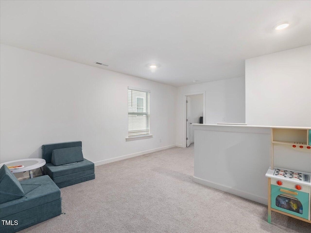 146 Bent Willow Dr, Clayton, NC 27527 - living area featuring carpet flooring, baseboards, and recessed lighting