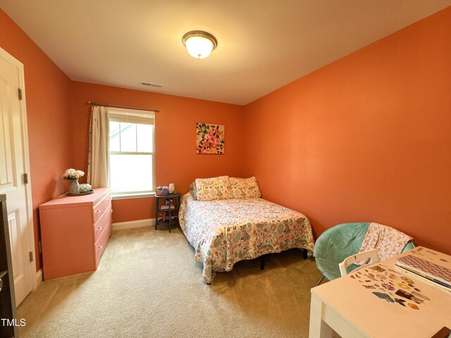 212 Hardwick St, Clayton, NC 27527 - bedroom with light colored carpet and baseboards