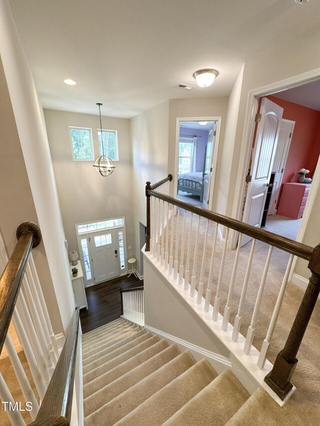 212 Hardwick St, Clayton, NC 27527 - staircase featuring plenty of natural light, baseboards, wood finished floors, and recessed lighting