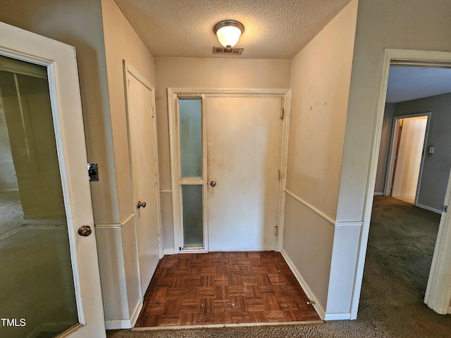 3559 Mill Run, Raleigh, NC 27612 - foyer entrance with a textured ceiling and baseboards