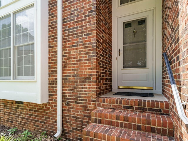 108 S Drawbridge Ln, Cary, NC 27513 - doorway to property featuring brick siding