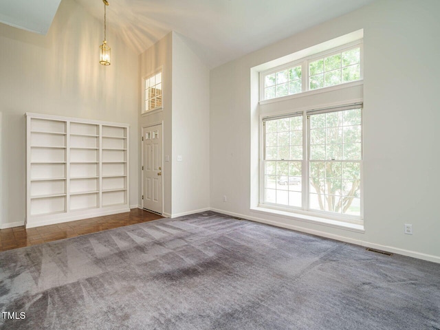 108 S Drawbridge Ln, Cary, NC 27513 - spare room with carpet and a high ceiling
