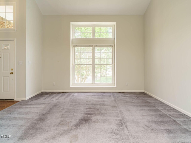 108 S Drawbridge Ln, Cary, NC 27513 - carpeted empty room featuring baseboards