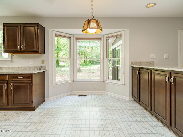 108 S Drawbridge Ln, Cary, NC 27513 - unfurnished dining area featuring plenty of natural light
