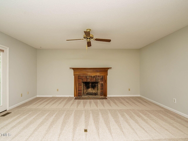 108 S Drawbridge Ln, Cary, NC 27513 - unfurnished living room with a ceiling fan, light colored carpet, and a fireplace