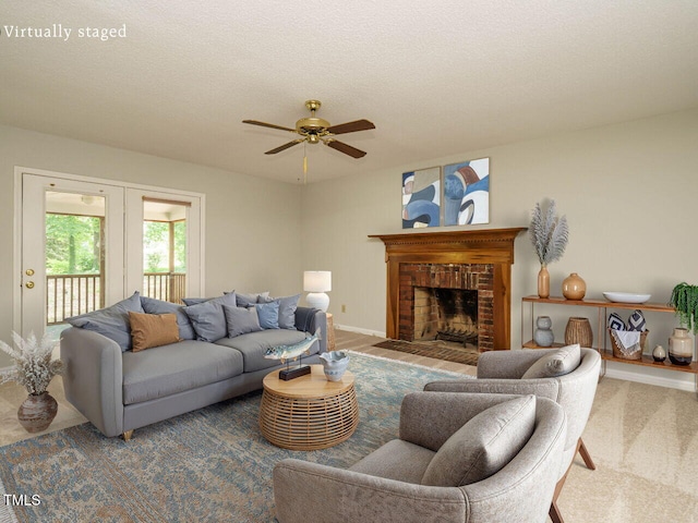 108 S Drawbridge Ln, Cary, NC 27513 - living area with a ceiling fan, a fireplace, french doors, and carpet