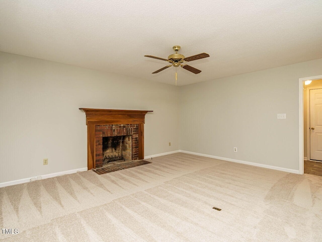 108 S Drawbridge Ln, Cary, NC 27513 - unfurnished living room featuring ceiling fan, carpet flooring, and a fireplace