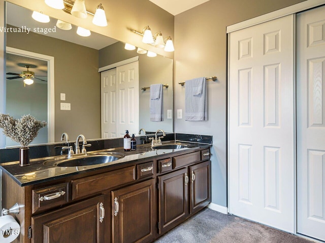 108 S Drawbridge Ln, Cary, NC 27513 - bathroom with double vanity and a ceiling fan