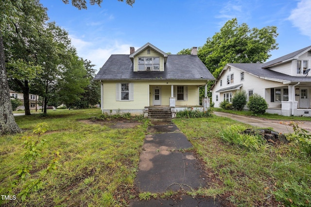 421 E Morehead St, Burlington, NC 27215 - bungalow-style home featuring covered porch and a chimney