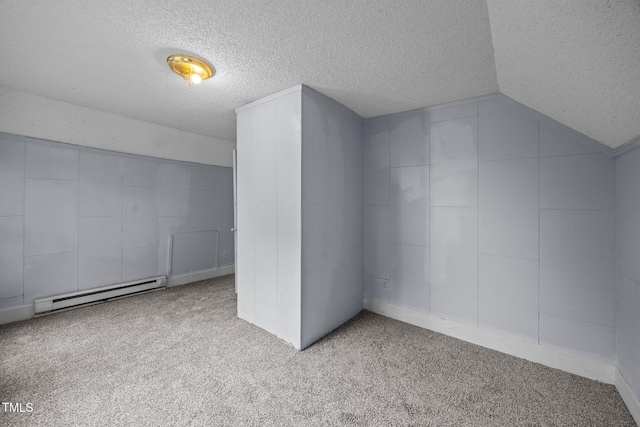 421 E Morehead St, Burlington, NC 27215 - bonus room featuring baseboard heating, a textured ceiling, carpet floors, and vaulted ceiling