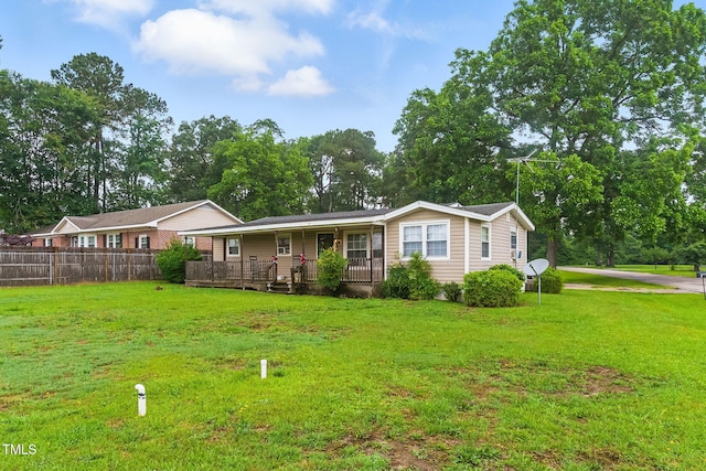 480 Five Bridge Rd, Clinton, NC 28328 - view of front of house with a porch and view of wooded area