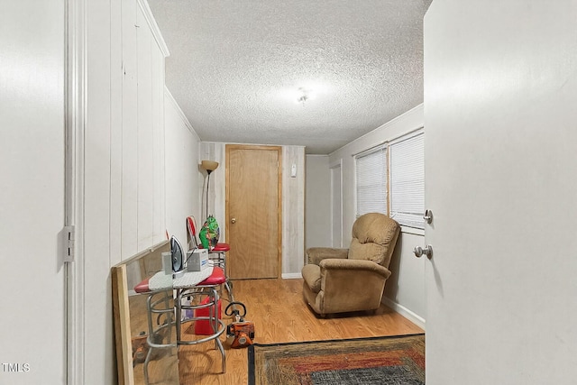 480 Five Bridge Rd, Clinton, NC 28328 - living area featuring wood finished floors, a textured ceiling, and ornamental molding