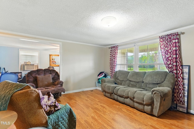 480 Five Bridge Rd, Clinton, NC 28328 - living room with ornamental molding, wood finished floors, a textured ceiling, cooling unit, and baseboards