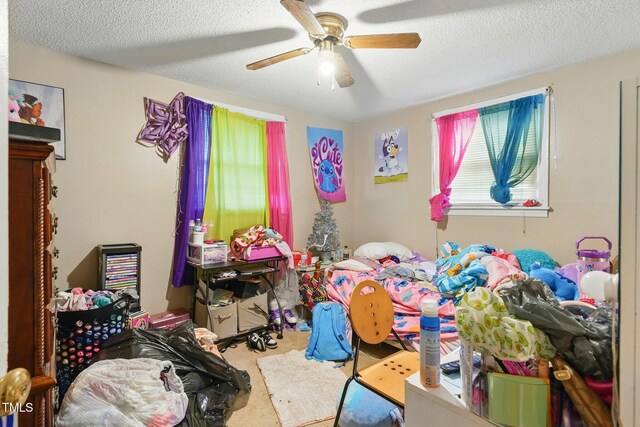 480 Five Bridge Rd, Clinton, NC 28328 - bedroom with a ceiling fan, a textured ceiling, and carpet