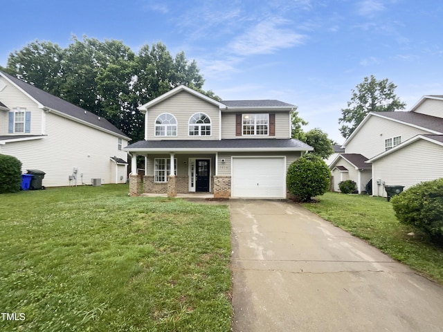 1216 Briarwood Dr, Mebane, NC 27302 - traditional home featuring a porch, driveway, a front lawn, an attached garage, and brick siding