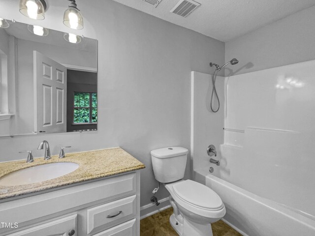 1216 Briarwood Dr, Mebane, NC 27302 - full bathroom with toilet, vanity,  shower combination, baseboards, and tile patterned floors