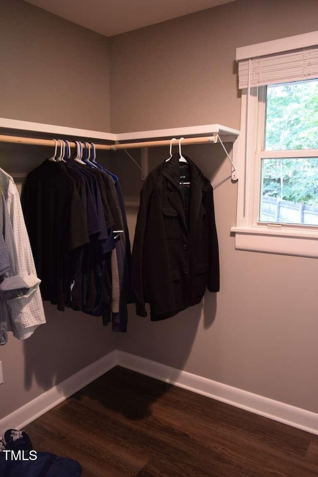 515 Wildwood Dr, Durham, NC 27712 - walk in closet featuring wood finished floors