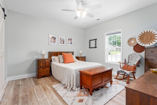 101 Hazy Ln, Thomasville, NC 27360 - bedroom featuring light wood finished floors, baseboards, and ceiling fan