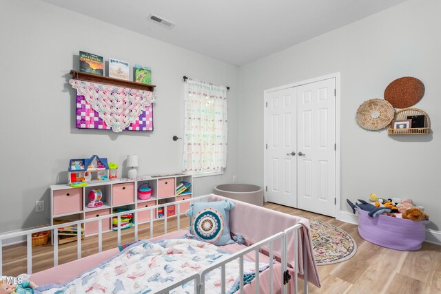101 Hazy Ln, Thomasville, NC 27360 - bedroom with wood finished floors, a closet, and baseboards