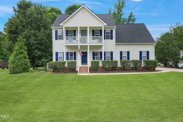 750 Raymond Dr, Clayton, NC 27527 - neoclassical home featuring a balcony, a front yard, covered porch, and roof with shingles