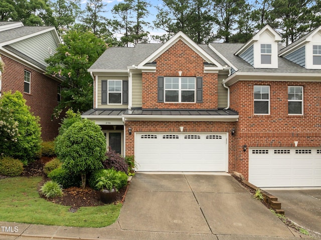 238 Langford Valley Way, Cary, NC 27513 - view of front of home featuring a garage, driveway, brick siding, and roof with shingles