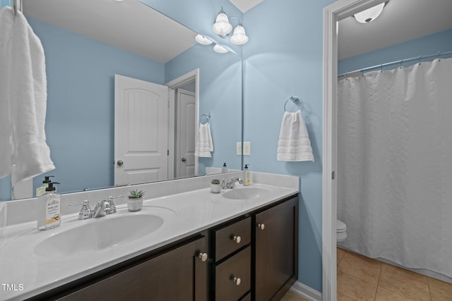 238 Langford Valley Way, Cary, NC 27513 - bathroom with double vanity, toilet, and tile patterned flooring