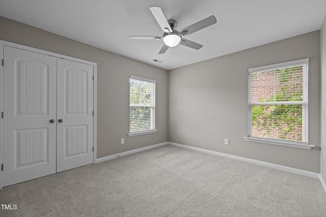 238 Langford Valley Way, Cary, NC 27513 - unfurnished bedroom with carpet, baseboards, a closet, and ceiling fan