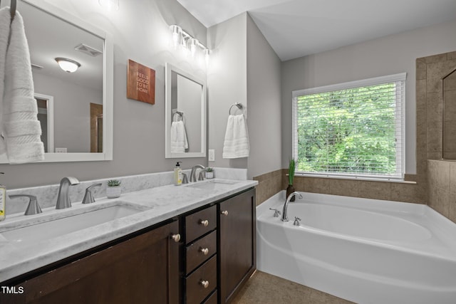 238 Langford Valley Way, Cary, NC 27513 - bathroom featuring a bath and double vanity